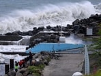 Waves crash as the tropical system "Garance" approaches in La Possession, on the French overseas territory island of La Reunion on February 26, 2025.
