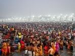 Pilgrims take a holy dip in Sangam, the confluence of Ganges, Yamuna and mythical Saraswati rivers, on the occasion of Maha Shivaratri during the Maha Kumbh Mela festival in Prayagraj.