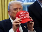 U.S. President Donald Trump holds a hat after signing an executive order in the Oval Office, at the White House in Washington, D.C., U.S. February 25, 2025. U.S. President Donald Trump holds a hat after signing an executive order in the Oval Office, at the White House in Washington, D.C., U.S. February 25, 2025.