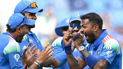 India's Hardik Pandya with captain Rohit Sharma and teammates celebrates (ICC-X)