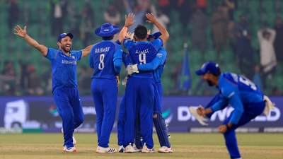 Afghanistan players celebrate after winning the match their Group B match against England (REUTERS) Afghanistan players celebrate after winning the match their Group B match against England (REUTERS)
