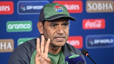 Pakistan's head coach Aaqib Javed speaks during a press conference on the eve of the ICC Champions Trophy (AFP)