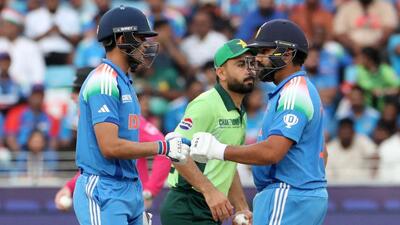 India's Shubman Gill and Rohit Sharma bump fists. (REUTERS) India's Shubman Gill and Rohit Sharma bump fists. (REUTERS)