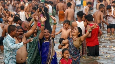 Pilgrims cheer after they take a holy dip in Sangam on the last day of the Maha Kumbh Mela festival in Prayagraj. (Niharika Kulkarni/AFP) Pilgrims cheer after they take a holy dip in Sangam on the last day of the Maha Kumbh Mela festival in Prayagraj. (Niharika Kulkarni/AFP)