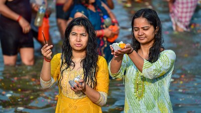 Devotees perform rituals as they take a holy dip at Sangam on the occasion of Maha Shivratri in Prayagraj. (PTI) Devotees perform rituals as they take a holy dip at Sangam on the occasion of Maha Shivratri in Prayagraj. (PTI)