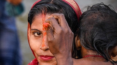 A pilgrim offers prayers after taking a holy dip in Sangam, the confluence of Ganges, Yamuna and mythical Saraswati rivers, on the occasion of Maha Shivaratri during the Maha Kumbh Mela festival in Prayagraj on February 26, 2025. (Punit Paranjpe/AFP) A pilgrim offers prayers after taking a holy dip in Sangam, the confluence of Ganges, Yamuna and mythical Saraswati rivers, on the occasion of Maha Shivaratri during the Maha Kumbh Mela festival in Prayagraj on February 26, 2025. (Punit Paranjpe/AFP)