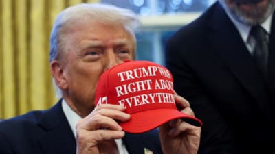 U.S. President Donald Trump holds a hat after signing an executive order in the Oval Office, at the White House in Washington, D.C., U.S. February 25, 2025. (Reuters) U.S. President Donald Trump holds a hat after signing an executive order in the Oval Office, at the White House in Washington, D.C., U.S. February 25, 2025. (Reuters)