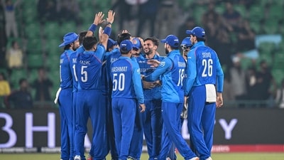 Afghanistan's Azmatullah Omarzai (C) celebrates with teammates after taking a catch to dismiss England's Jamie Smith (AFP) Afghanistan's Azmatullah Omarzai (C) celebrates with teammates after taking a catch to dismiss England's Jamie Smith (AFP)