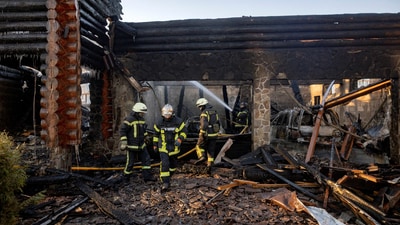 Firefighters work at a site of a Russian drone strike, amid Russia's attack on Ukraine, in the Kyiv region, Ukraine February 26, 2025. (REUTERS/Thomas Peter)
