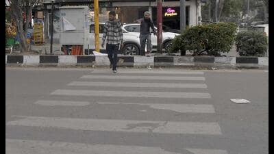 Zebra crossing marks have faded on several roads in the city. (HT Photo)