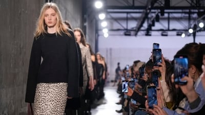 A model wears a creation as part of the N.21 Fall/Winter 2025-2026 Womenswear collection presented in Milan. (AP) A model wears a creation as part of the N.21 Fall/Winter 2025-2026 Womenswear collection presented in Milan. (AP)