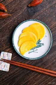 Pickled daikon aka Takuan, a classic Japanese accompaniment for sushi Pickled daikon aka Takuan, a classic Japanese accompaniment for sushi