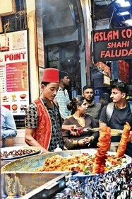 From sizzling kebabs to delightful sweet treats, visitors can indulge in a variety of mouth-watering dishes at some of the iconic eateries of Old Delhi.