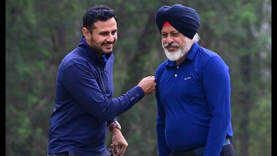 Players Parampreet Sidhu and Dr Jaspreet Batth (right) during the Chasma Shah Golf Team Championship at Chandigarh Golf Club on Wednesday. (Keshav Singh/HT)