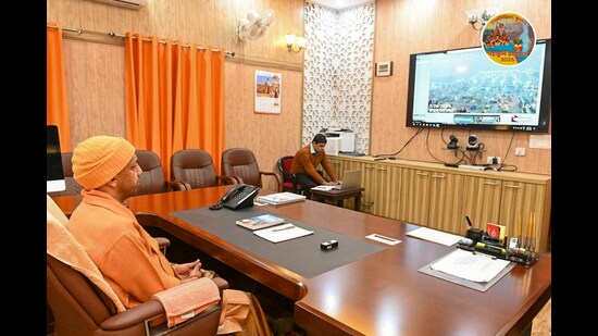 UP Chief Minister Yogi Adityanath monitors the holy bath of Maha Shivratri going on in Prayagraj from the control room located at Gorakhnath temple. (PTI)
