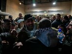 Palestinian prisoners are greeted after being released from Israeli prison following a ceasefire agreement between Israel and Hamas, in the West Bank city of Ramallah, Thursday, Feb. 27, 2025 Palestinian prisoners are greeted after being released from Israeli prison following a ceasefire agreement between Israel and Hamas, in the West Bank city of Ramallah, Thursday, Feb. 27, 2025
