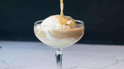 Affogato Martini is a blend of coffee liqueur, espresso, and aged rum, topped with a scoop of gelato — a nod to the classic Italian affogato. Affogato Martini is a blend of coffee liqueur, espresso, and aged rum, topped with a scoop of gelato — a nod to the classic Italian affogato.