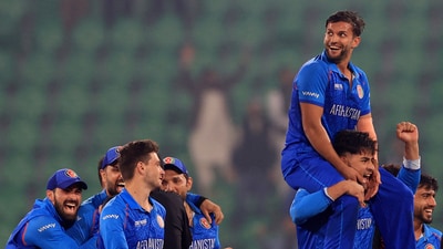 Lahore, Feb 26 (ANI): Afghanistan players celebrate after winning the match their Group B match against England in the ICC Champions Trophy, 2025, at Gaddafi Stadium in Lahore on Wednesday. (Reuters/ANI) (REUTERS) Lahore, Feb 26 (ANI): Afghanistan players celebrate after winning the match their Group B match against England in the ICC Champions Trophy, 2025, at Gaddafi Stadium in Lahore on Wednesday. (Reuters/ANI) (REUTERS)