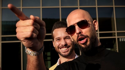 Andrew Tate, next to his brother Tristan, outside the Bucharest Tribunal in Bucharest, Romania, Thursday, Jan. 9, 2025. (AP) Andrew Tate, next to his brother Tristan, outside the Bucharest Tribunal in Bucharest, Romania, Thursday, Jan. 9, 2025. (AP)