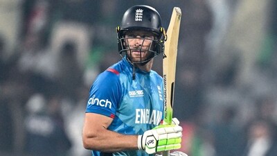 England's captain Jos Buttler looks on as he walks back to the pavilion after his dismissal against Afghanistan (AFP) England's captain Jos Buttler looks on as he walks back to the pavilion after his dismissal against Afghanistan (AFP)