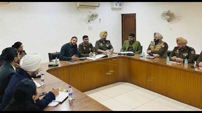 DC Jitendra Jorwal and police commissioner Kuldeep Singh Chahal addressing a meeting in Ludhiana on Thursday. (HT Photo)