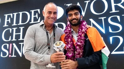 Paddy Upton (L) poses for a photo with D Gukesh in Singapore. ((Maria Emelianova/FIDE)) Paddy Upton (L) poses for a photo with D Gukesh in Singapore. ((Maria Emelianova/FIDE))