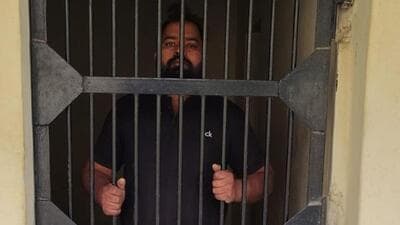 The smuggler after his arrest. The smuggler after his arrest.
