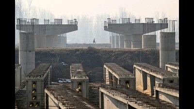 This picture taken on January 15, 2025, shows the under construction Srinagar ring road in Baramulla, Jammu and Kashmir. Farmers in Indian-administered Kashmir say a major government infrastructure drive is taking their deeply cherished land, fearing it spearheads a push to "Hinduise" the disputed Muslim-majority territory. (Photo by Tauseef MUSTAFA / AFP) (AFP) This picture taken on January 15, 2025, shows the under construction Srinagar ring road in Baramulla, Jammu and Kashmir. Farmers in Indian-administered Kashmir say a major government infrastructure drive is taking their deeply cherished land, fearing it spearheads a push to "Hinduise" the disputed Muslim-majority territory. (Photo by Tauseef MUSTAFA / AFP) (AFP)