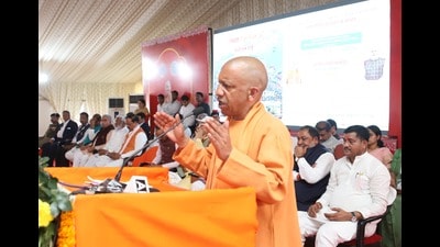UP CM Yogi Adityanath addressing sanitation and health workers at Mahakumbh Nagar in Prayagraj on Thursday. (HT Photo) UP CM Yogi Adityanath addressing sanitation and health workers at Mahakumbh Nagar in Prayagraj on Thursday. (HT Photo)