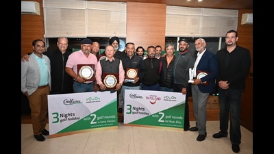 Winners of the 9th Chasma Shah Team Golf Championship with their trophies at Chandigarh Golf Club on Thursday. (Ravi Kumar/HT)