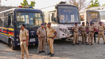 Police personnel guard at the Swargate bus stand in Oune after the alleged rape of a 26-year-old woman inside a Maharashtra State Road Transport Corporation (MSRTC) bus (PTI) Police personnel guard at the Swargate bus stand in Oune after the alleged rape of a 26-year-old woman inside a Maharashtra State Road Transport Corporation (MSRTC) bus (PTI)