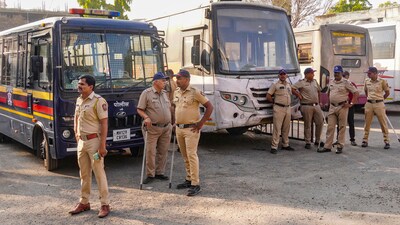 Police personnel guard at the Swargate Bus Stand after the alleged rape of a 26-year-old woman inside a Maharashtra State Road Transport Corporation (MSRTC) bus in Pune on Feb. 27, 2025. (PTI) Police personnel guard at the Swargate Bus Stand after the alleged rape of a 26-year-old woman inside a Maharashtra State Road Transport Corporation (MSRTC) bus in Pune on Feb. 27, 2025. (PTI)
