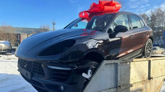 Pictures of a Porsche in a dumpster went viral on Russian social media (Telegram)