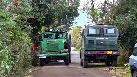 Security forces vehicles during a search operation to flush out terrorists who opened fire on an Army vehicle the previous day, near the Line of Control (LoC) in the Sunderbani sector of J&K’s Rajouri district, on Thursday. (PTI)