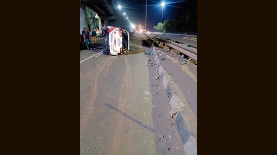 The collision below the Sector-20 flyover caused the police emergency response vehicle to flip multiple times. (HT Photo)
