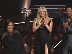 Lizzo accepts the award for Video For Good for About Damn Time as Bebe Rexha looks on at MTV VMAs. (REUTERS)