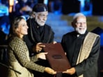 Prime Minister Narendra Modi being presented a memento by festival founder Muzaffar Ali's wife Meera Ali at the 25th Anniversary Of Sufi Music Festival 'Jahan-E-Khusrau', at Sunder Nursery in New Delhi on Friday