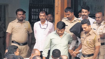 Accused arrested for the alleged sexual assault of a woman inside a parked state transport bus at Swargate terminus, being produced at a court, in Pune, Friday. Accused allegedly attempted suicide to evade arrest, police officials said. (PTI) Accused arrested for the alleged sexual assault of a woman inside a parked state transport bus at Swargate terminus, being produced at a court, in Pune, Friday. Accused allegedly attempted suicide to evade arrest, police officials said. (PTI)