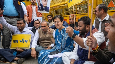 New Delhi, India - Feb. 27, 2025: LoP in Delhi Assembly Atishi along with AAP MLAs stages a protest outside the Legislative Assembly after not being allowed to enter the Assembly in New Delhi. (RAJ K RAJ /HT PHOTO) New Delhi, India - Feb. 27, 2025: LoP in Delhi Assembly Atishi along with AAP MLAs stages a protest outside the Legislative Assembly after not being allowed to enter the Assembly in New Delhi. (RAJ K RAJ /HT PHOTO)
