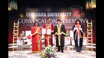 Honorary doctorate being awarded to Thumbay Moideen, founder president of Thumbay Group, at a special convocation ceremony held at Chitkara University on Thursday. (HT)
