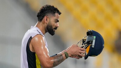India's Virat Kohli wears his helmet to bat in the nets. (AP) India's Virat Kohli wears his helmet to bat in the nets. (AP)