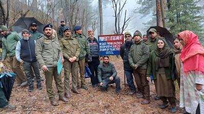 Jammu and Kashmir Police personnel at one of the properties that was attached in Ramban on Friday. (HT Photo) Jammu and Kashmir Police personnel at one of the properties that was attached in Ramban on Friday. (HT Photo)