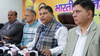 Jammu and Kashmir BJP President Sat Paul Sharma along with senior leaders addresses a press conference. (PTI) Jammu and Kashmir BJP President Sat Paul Sharma along with senior leaders addresses a press conference. (PTI)