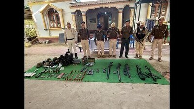 On the seventh day of the amnesty for the voluntary surrender of looted weapons and munitions, Arambai Tenggol, a Meitei group, surrendered 246 weapons at the 1st Manipur Rifles campus (HT PHOTO) On the seventh day of the amnesty for the voluntary surrender of looted weapons and munitions, Arambai Tenggol, a Meitei group, surrendered 246 weapons at the 1st Manipur Rifles campus (HT PHOTO)