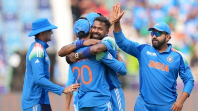 India captain Rohit (R) celebrates with teammates India captain Rohit (R) celebrates with teammates
