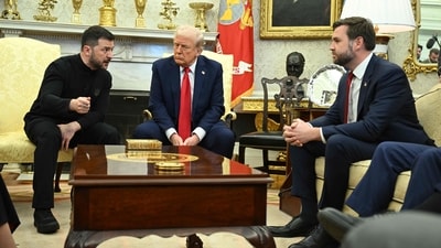 Ukraine's President Volodymyr Zelensky speaks to US Vice President JD Vance as they meet with President Donald Trump in the Oval Office of the White House in Washington, DC, February 28, 2025. (AFP)