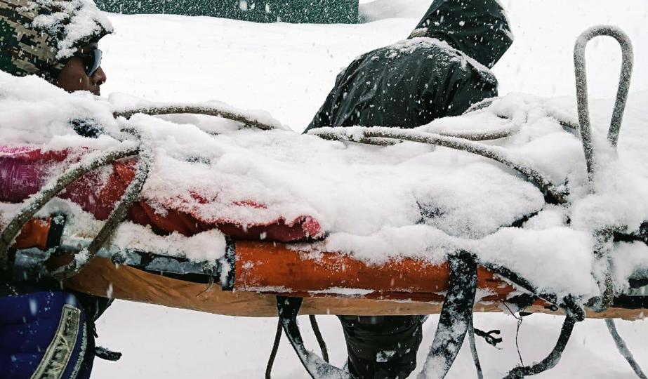Indian Army conducts a rescue operation after 57 workers engaged in road construction got trapped under huge blocks of snow during an avalanche (ANI)