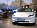 Tesla Model 3 supports up to 250 kW DC fast charging.(Bloomberg)