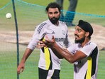 India's Arshdeep Singh and Mohammed Shami during a training session. India's Arshdeep Singh and Mohammed Shami during a training session.