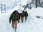Indo-Tibetan Border Police personnel carry out rescue operations for BRO workers who got trapped under snow following the avalanche that struck on Feb 28, near Mana in Chamoli on Saturday. Indo-Tibetan Border Police personnel carry out rescue operations for BRO workers who got trapped under snow following the avalanche that struck on Feb 28, near Mana in Chamoli on Saturday.